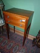 A charming good quality cabinet maker made Side Table standing on tapering square legs and having a