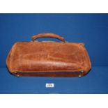 A brown leather Gladstone bag, a/f.