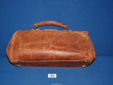 A brown leather Gladstone bag, a/f.