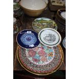 A decorative Italian Charger having raised floral detail, 14 1/2" diameter,