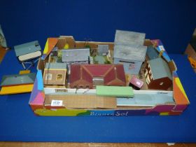A box of 'OO' gauge model Railway buildings, some with 12v electric lighting.
