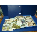 A box file of Postcards and a postcard album, mostly tourist, various ages.