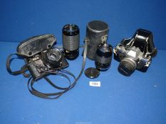 A quantity of cameras and lenses to include; Yashica FX-3, Olympus OM 10, Canon Macro lens 80-200mm,