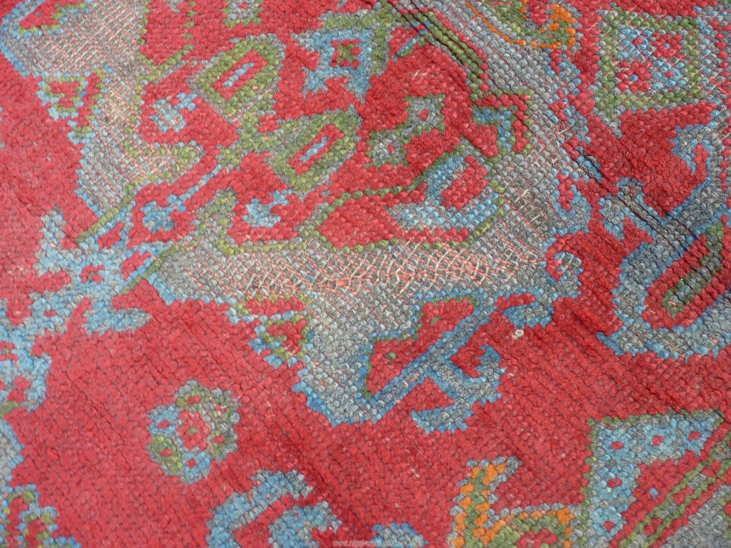 A large carpet in jewel colours. 172" x 114". - Image 6 of 7