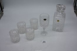 A Decanter and four matching cut glass tumblers (one a/f.), plus a crystal wine glass.