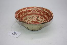 A fine small Hispano Moresque bowl, mid-17th century, the centre,