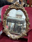 A gilt framed Mirror.