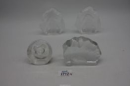 Four signed crystal glass sculptures including two single penguins , 4 3/4" tall, a baby seal,