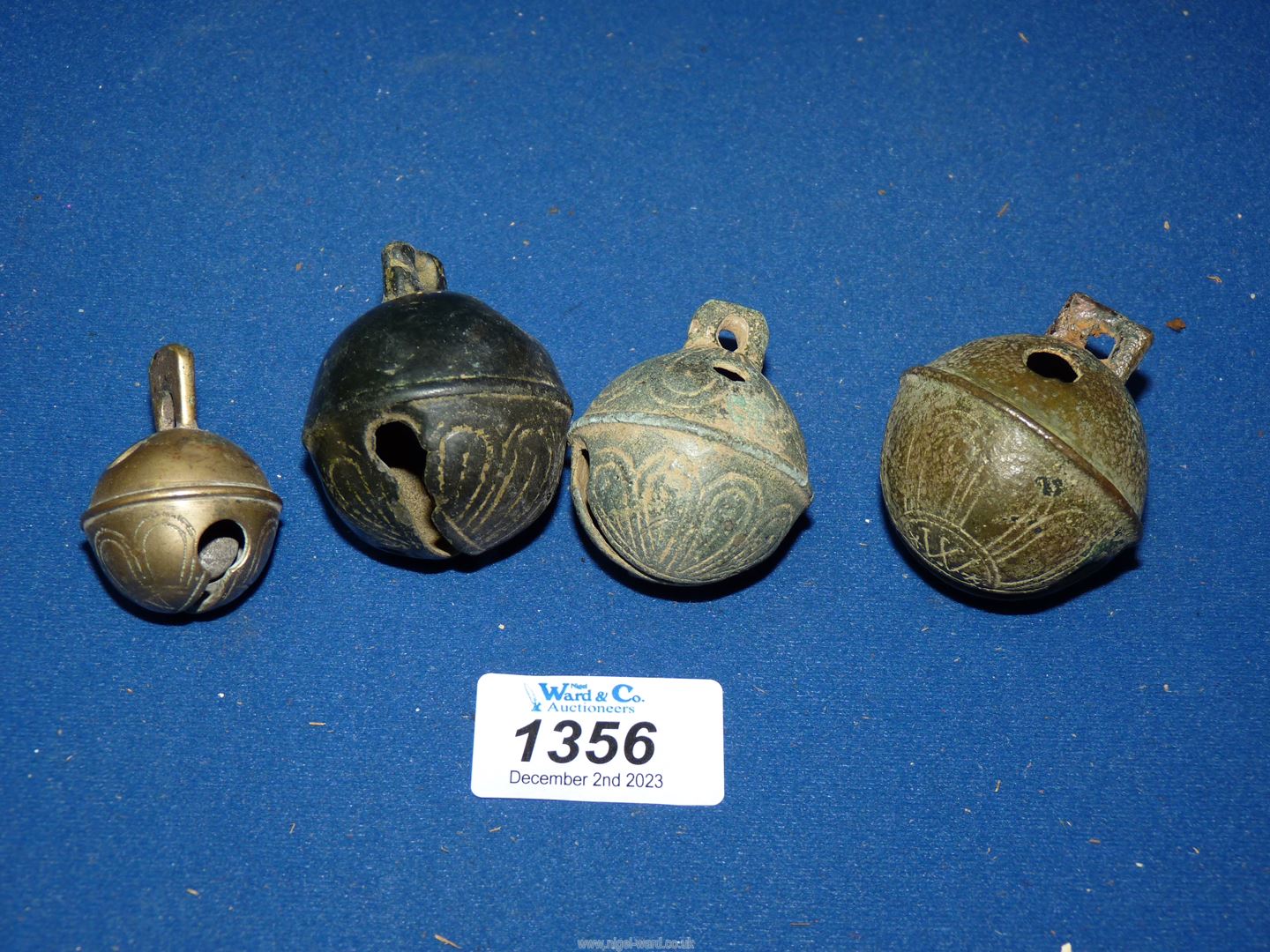 Four Crotal bells including Robert Wells and George Wells.