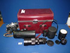 A Chinon 35mm camera, carry case and three lenses including Cimko 36-100mm - f3.5, Chinon 55mm - f1.