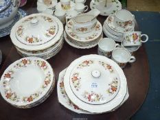 A Staffordshire Gem pottery diner service in floral pattern comprising six soup bowls,