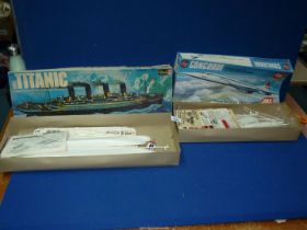 Two Revell kits; Titanic and an Airfix Concorde, both boxed.
