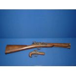 A small wooden replica pistol and a replica Blunderbuss style pistol ** NLW**
