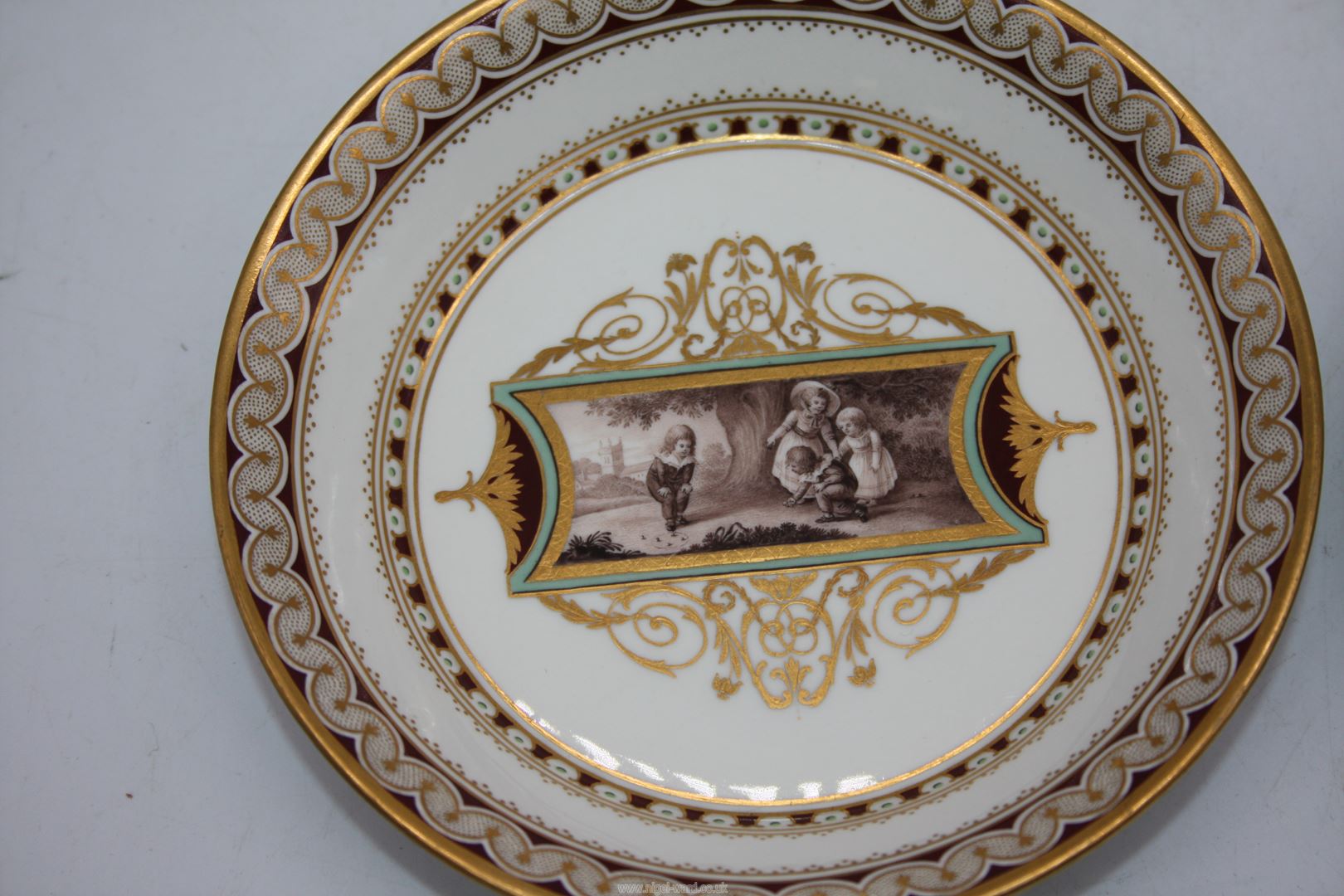 Two highly decorated Vienna porcelain Saucers, one having a scene of children playing, - Image 2 of 4