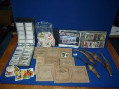 A quantity of cigarette card albums to include; Wills, Players, etc.