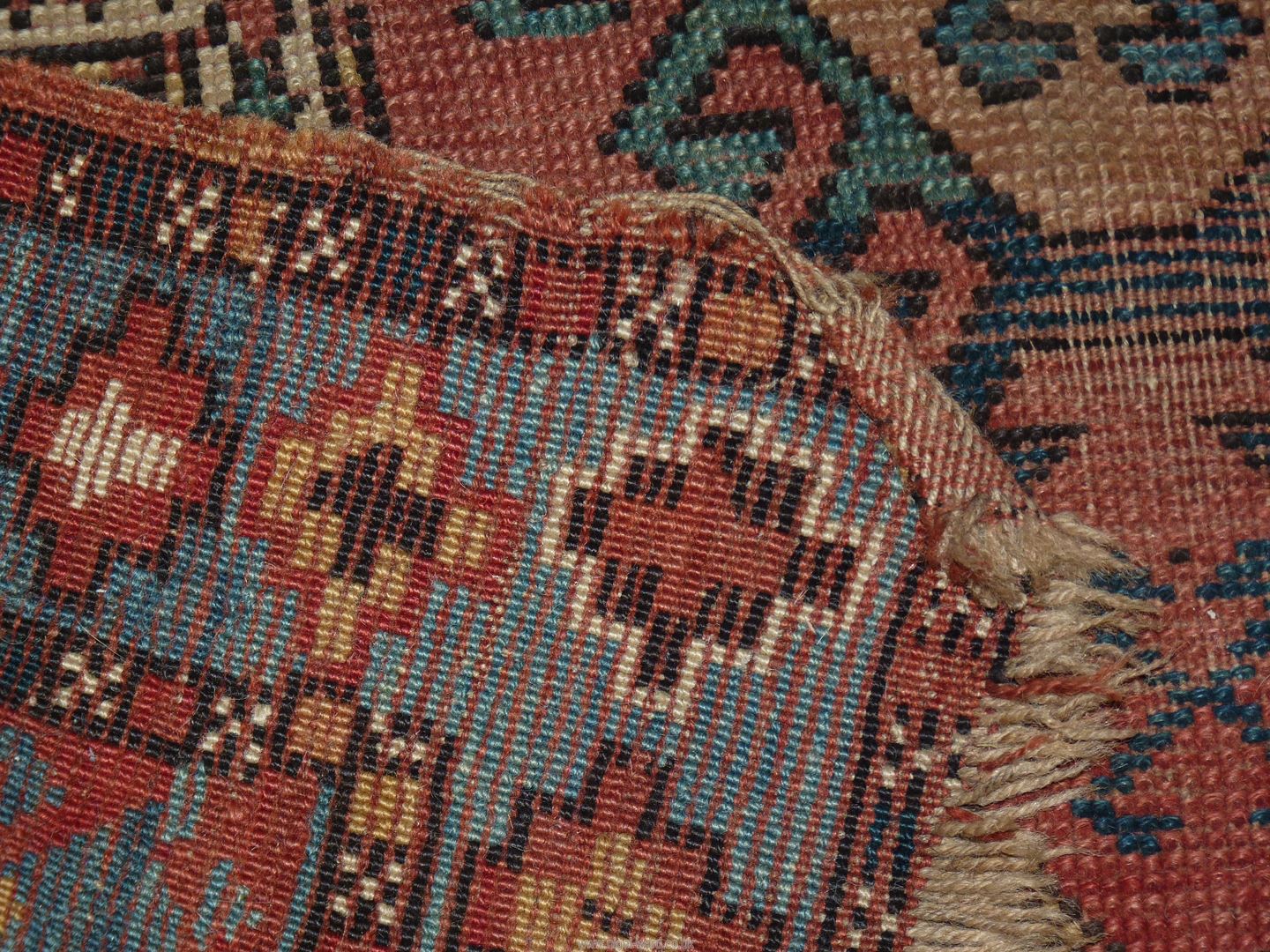 A border pattern rug in blue ground with red and cream geometric patterns, worn condition, - Image 4 of 4