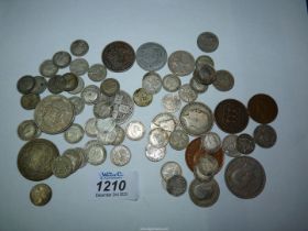 A quantity of coins to include; silver sixpences, three half crowns, two shilling piece,