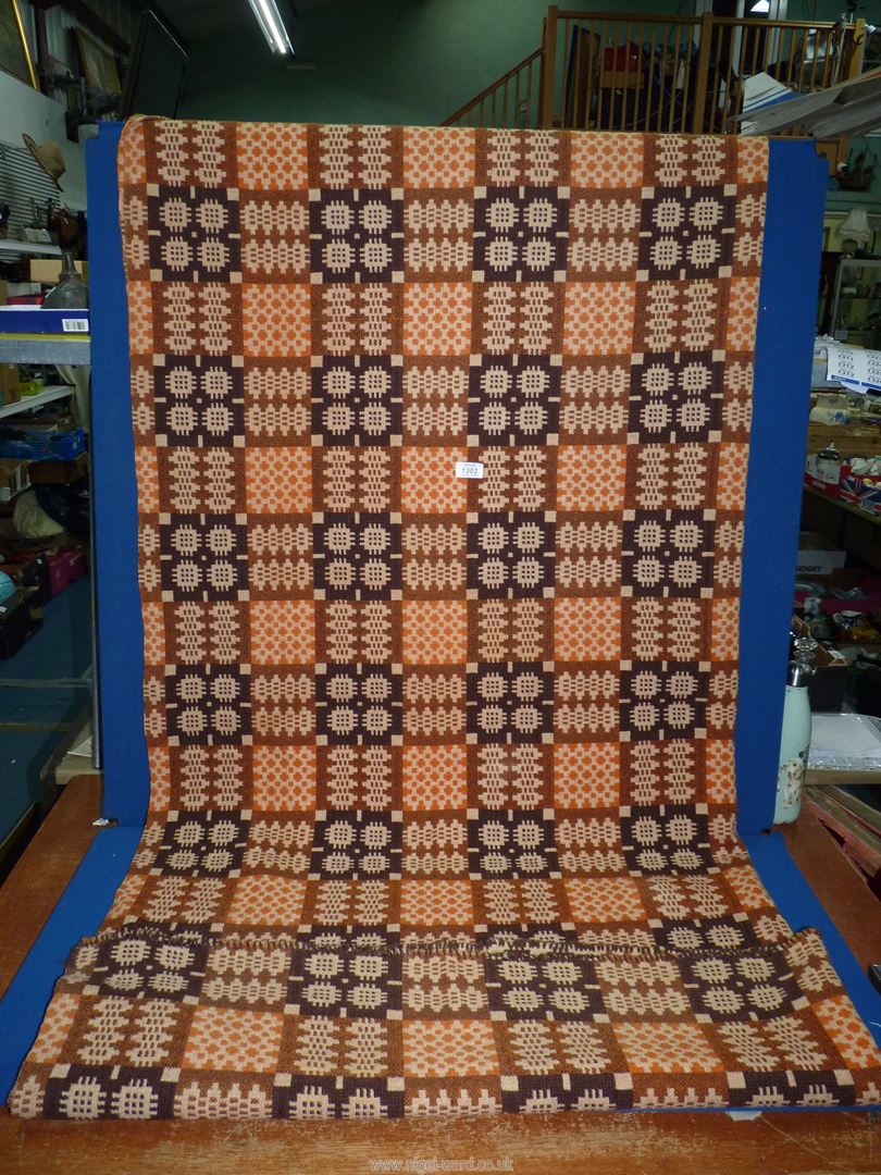 A brown Welsh Wool blanket, 78" x 70".