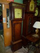 An unusual Oak cross-banded with Mahogany/Walnut eight day Long-case Clock having inlaid details,