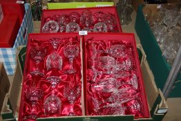 Six champagne glasses, six large wine glasses and six small wine glasses,