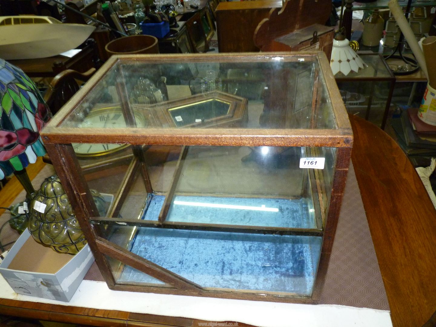 A two tier glass display Cabinet, 20" wide x 14" deep x 18" high (a/f). - Image 2 of 2