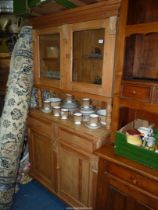 A Pine cottage Dresser, the base with a pair of opposing doors with a pair of frieze drawers over,
