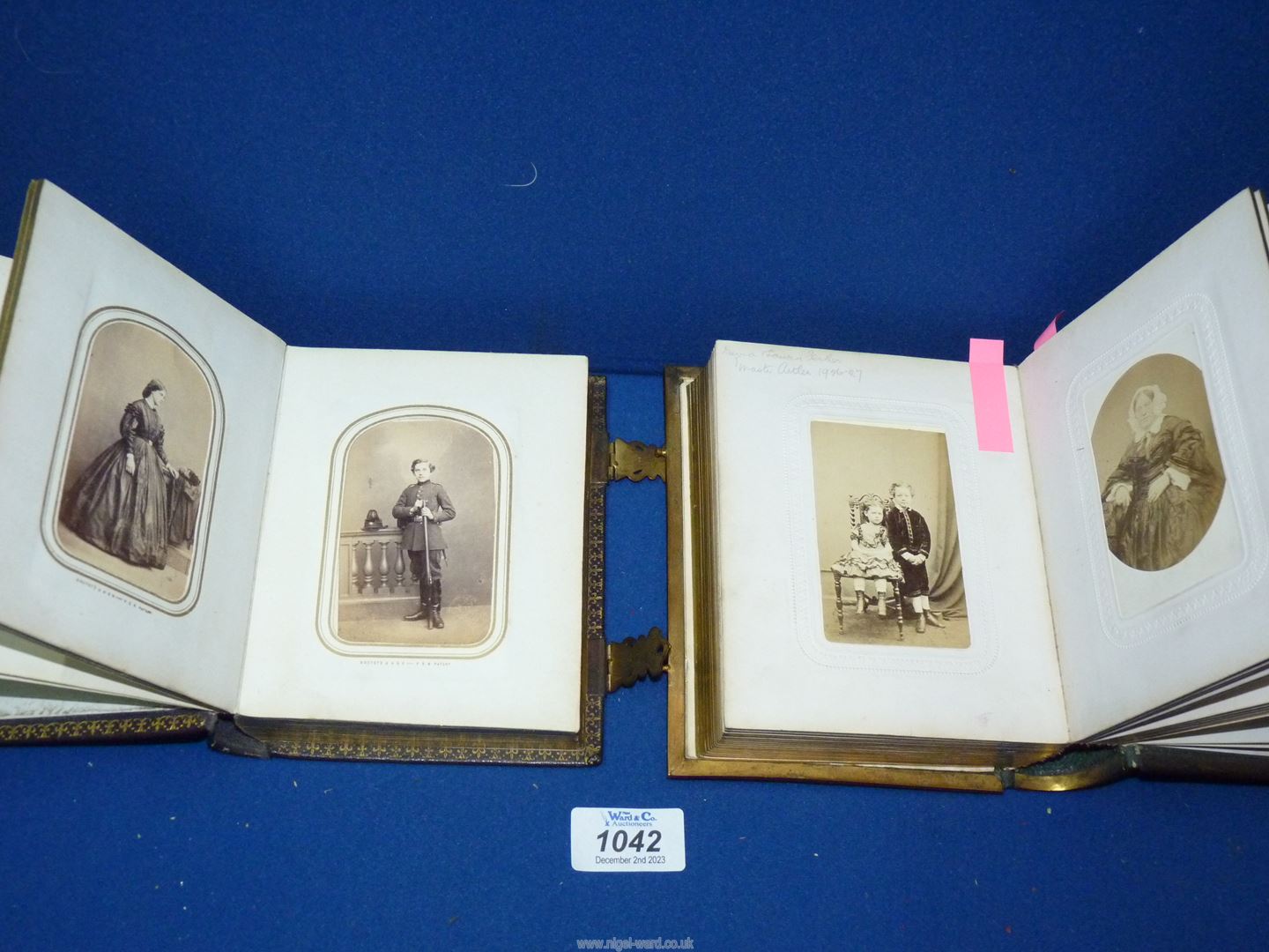 Two Victorian embossed leather and gilt metal mounted photograph albums, - Image 2 of 3