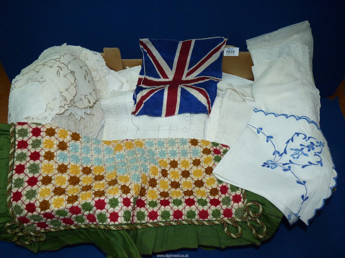 A large quantity of lace, tablecloths, runners and doilies etc.