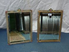 Two bevelled edge, floral and gilt framed table mirrors, 16 1/2" x 11 1/2".