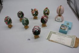 A quantity of Franklin Mint Faberge style eggs having floral design, etc, with certificates.