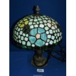 A Tiffany style lamp with multi colour floral shade, 13" tall.