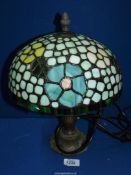 A Tiffany style lamp with multi colour floral shade, 13" tall.