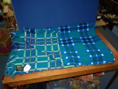 A large Derw reversible Welsh blanket in blue, 95'' x 79''.