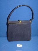 A vintage Corde navy handbag.