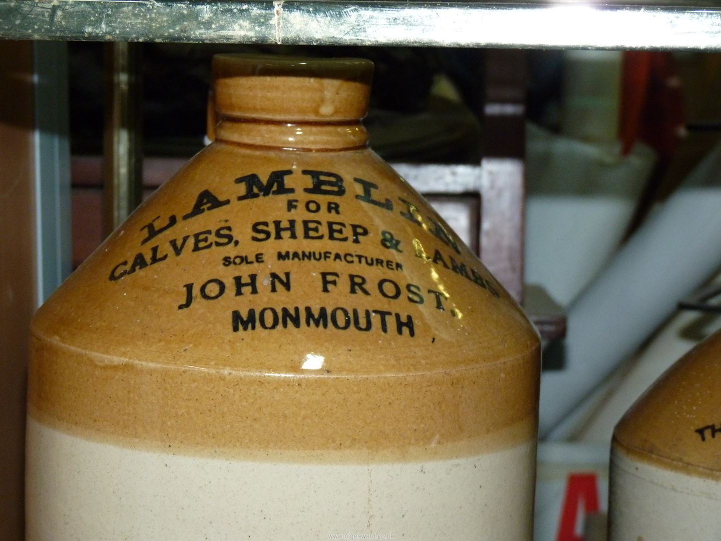 A large 'John Frost, Monmouth' stoneware Flagon, 'Gurneys Limited Grocer, - Image 2 of 2