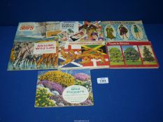 Seven Brooke Bond books including Flags & Emblems of The World, Famous People 1869-1969, etc.