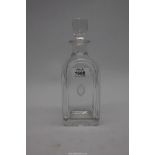 A glass decanter engraved Royal Cape Golf Club.