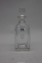 A glass decanter engraved Royal Cape Golf Club.