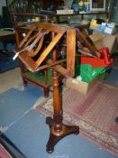 An early Victorian adjustable Mahogany Duet stand with lyre shaped fretwork decoration.