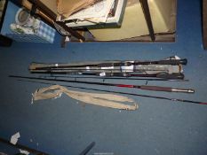 Three fishing rods including two Fladen bronze 7' rods and a Kassmar carbon composite fly rod,