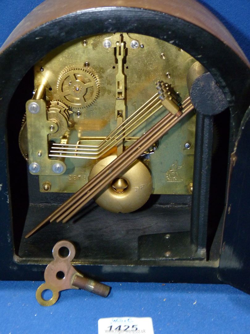 An Anvil wooden mantle clock with key and pendulum, 13'' wide x 8 1/2'' high. - Image 2 of 2