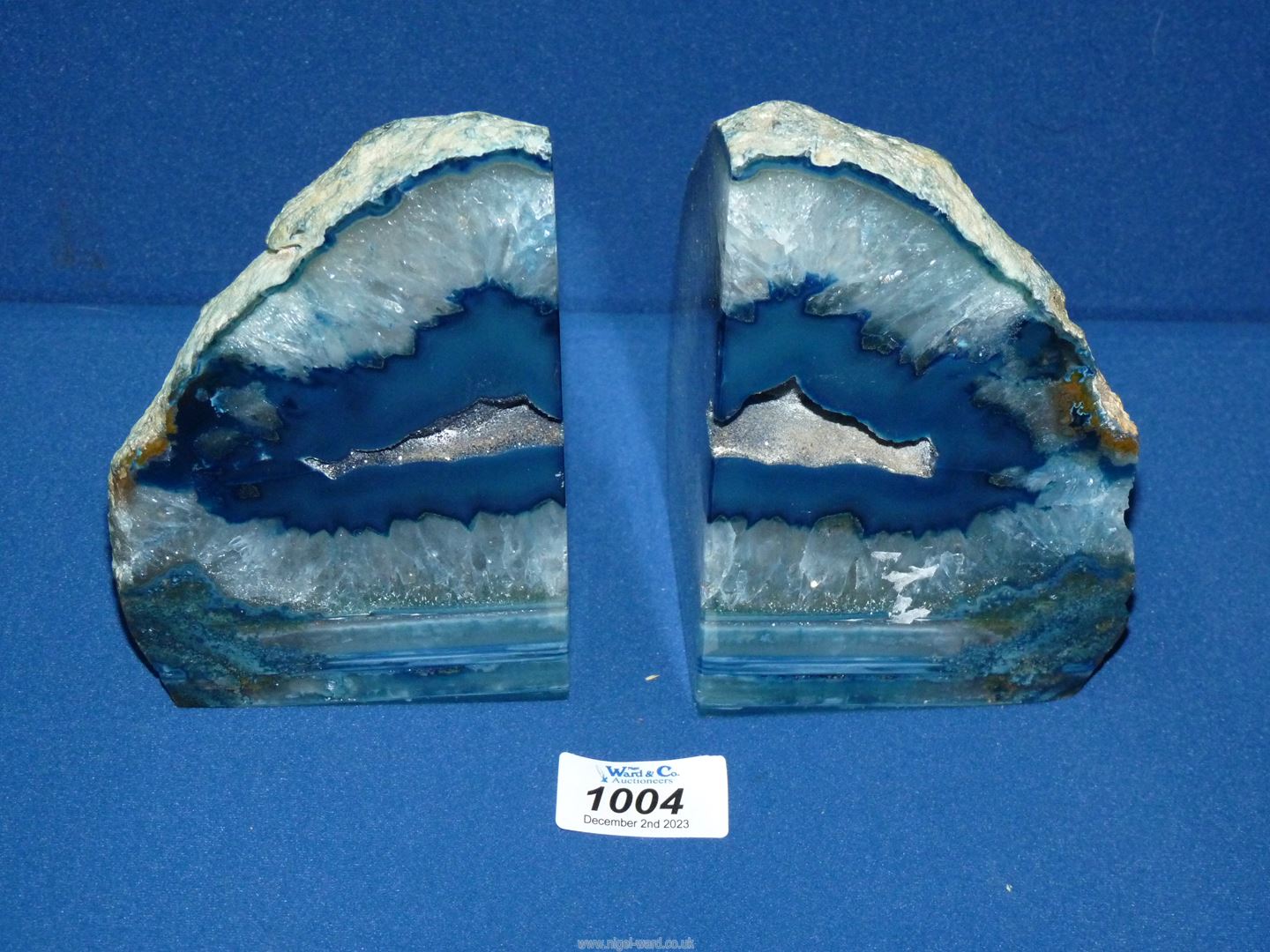 A pair of Bookends in polished blue agate, 6" tall.