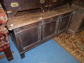 A dark Oak three panel Coffer/Blanket Chest with scratch moulded details,