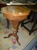 A Victorian Walnut octagonal Workbox Table,