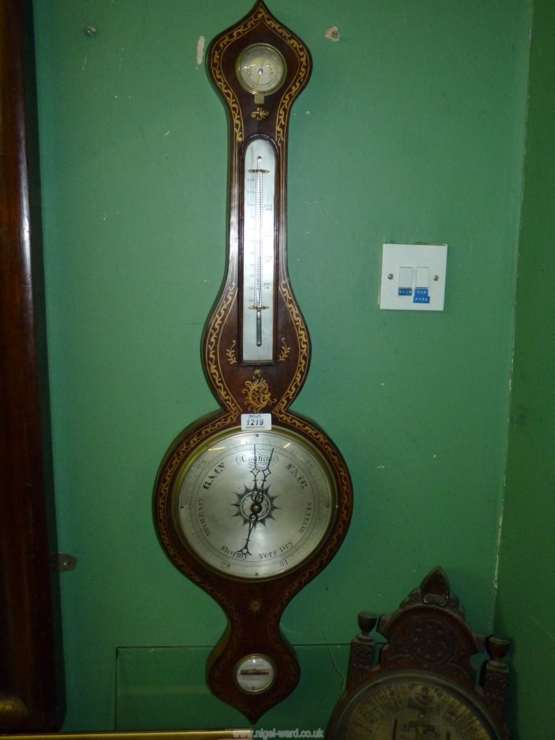 A Banjo Barometer with gilt scroll detail.