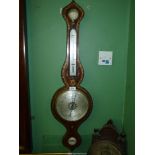 A Banjo Barometer with gilt scroll detail.