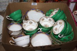 A quantity of part teasets to include; green and white Paragon, Standard blue and white, etc.