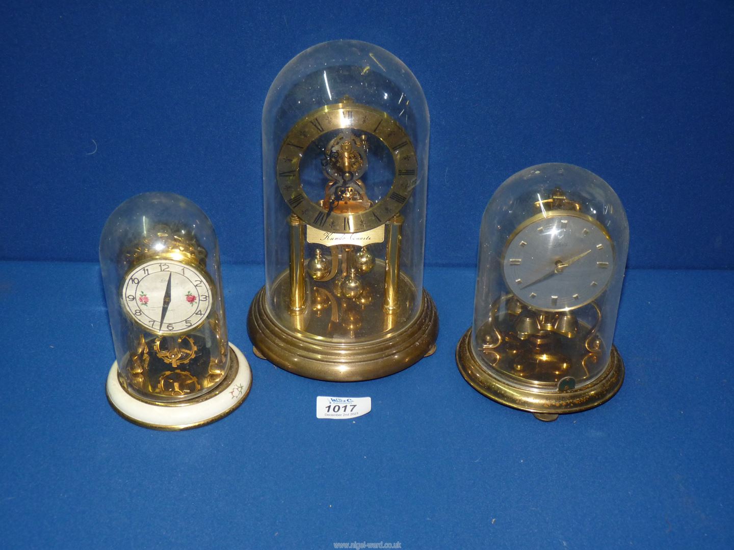 Three anniversary clocks including Kundo-Quartz and Schatz, all with plastic domes. - Image 2 of 2