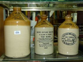 A large 'John Frost, Monmouth' stoneware Flagon, 'Gurneys Limited Grocer,