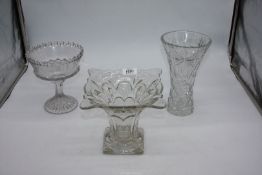 Two glass vases and a comport.